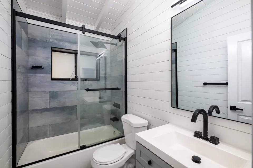 Bathroom with glass shower enclosure