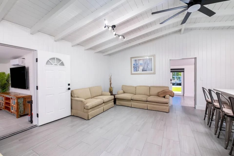 Open-plan living room with large sectional sofa